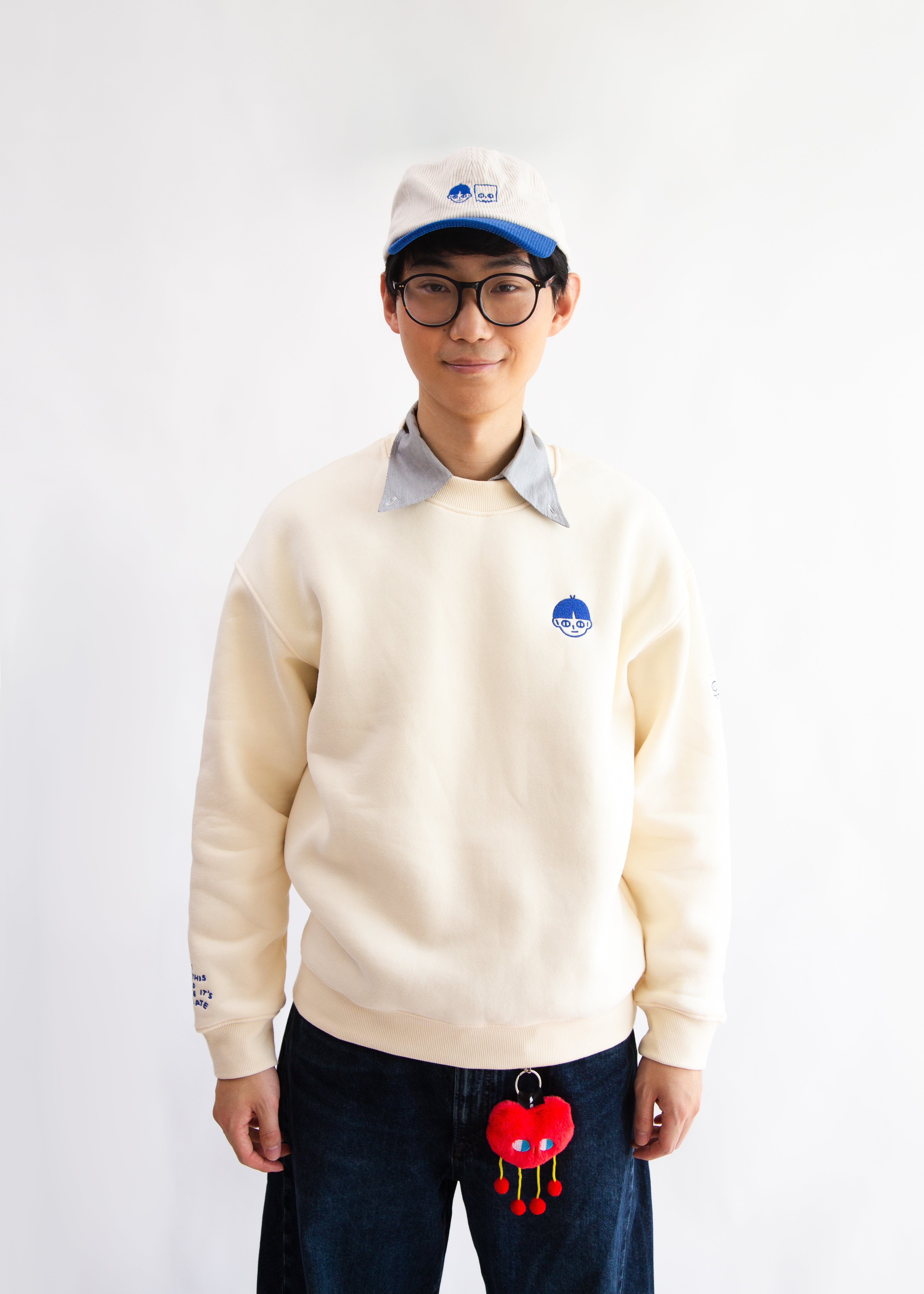 SIDEKICK: Cream fleece-lined crewneck sweater