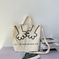 TE: Large white canvas tote bag