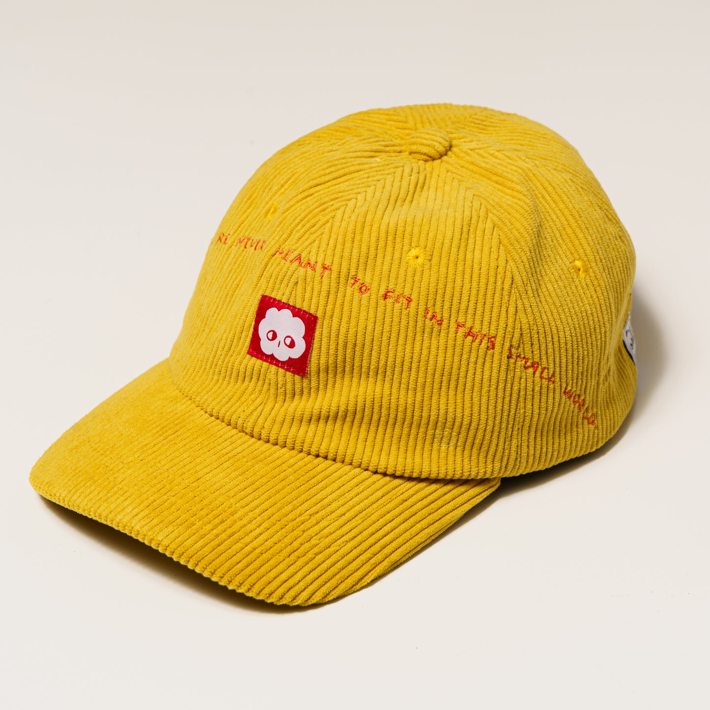 BIG DREAMS: Yellow corduroy baseball cap