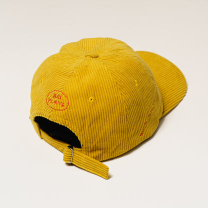 BIG DREAMS: Yellow corduroy baseball cap