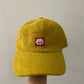 BIG PLANS: Yellow corduroy baseball cap